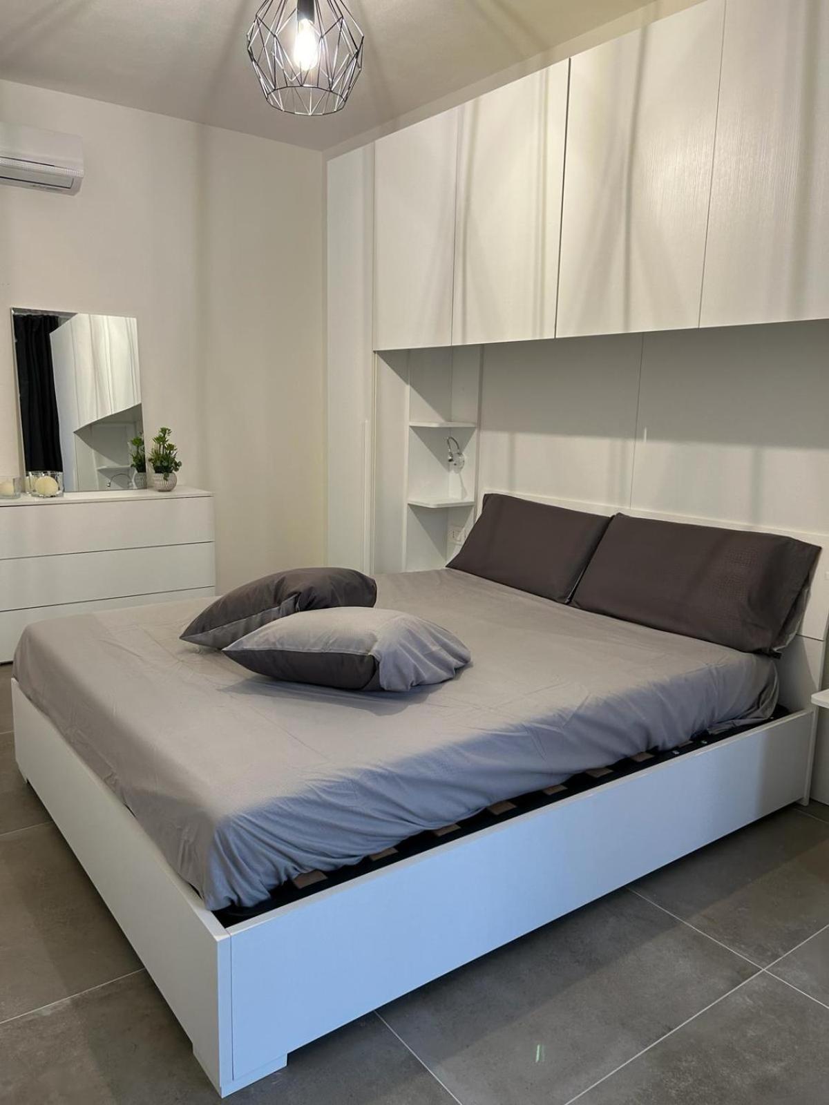 Family House Apartamento Porto Torres Exterior foto