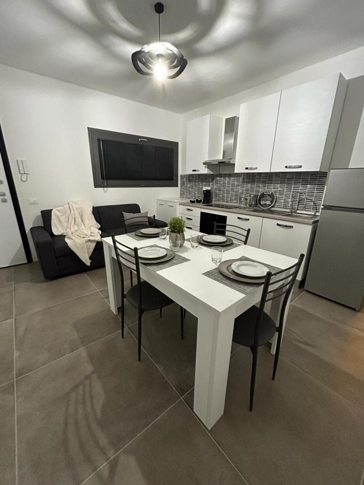 Family House Apartamento Porto Torres Exterior foto